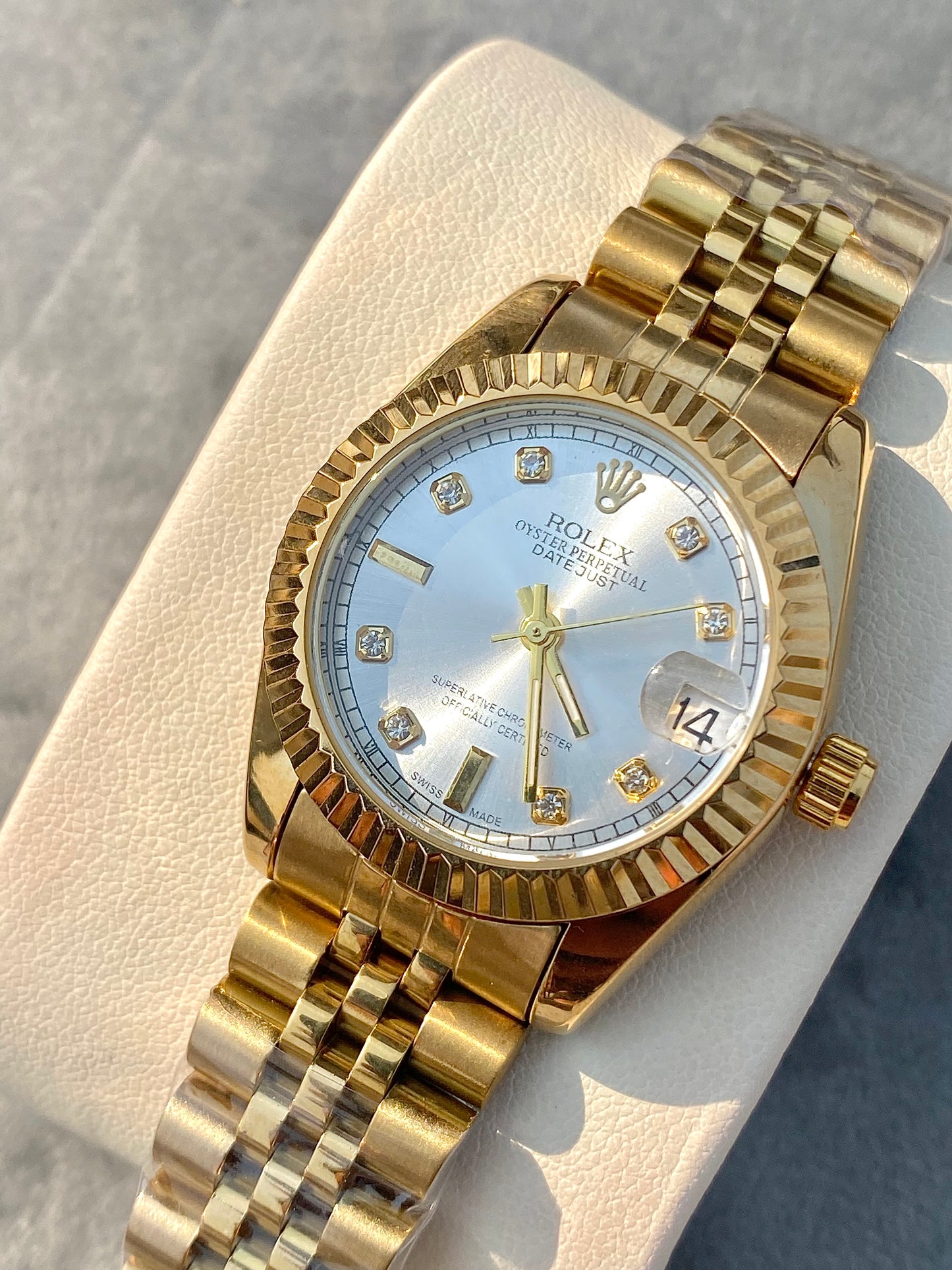 Pearl braided dial gold watch