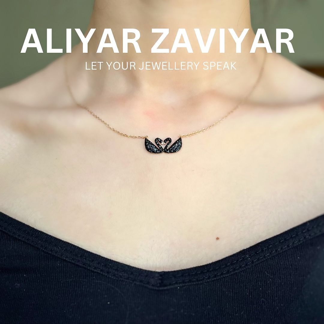 Black double duck pendant