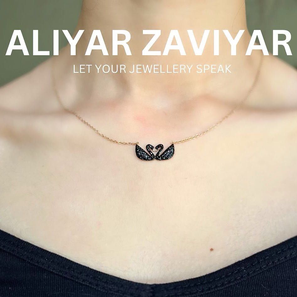 Black double duck pendant