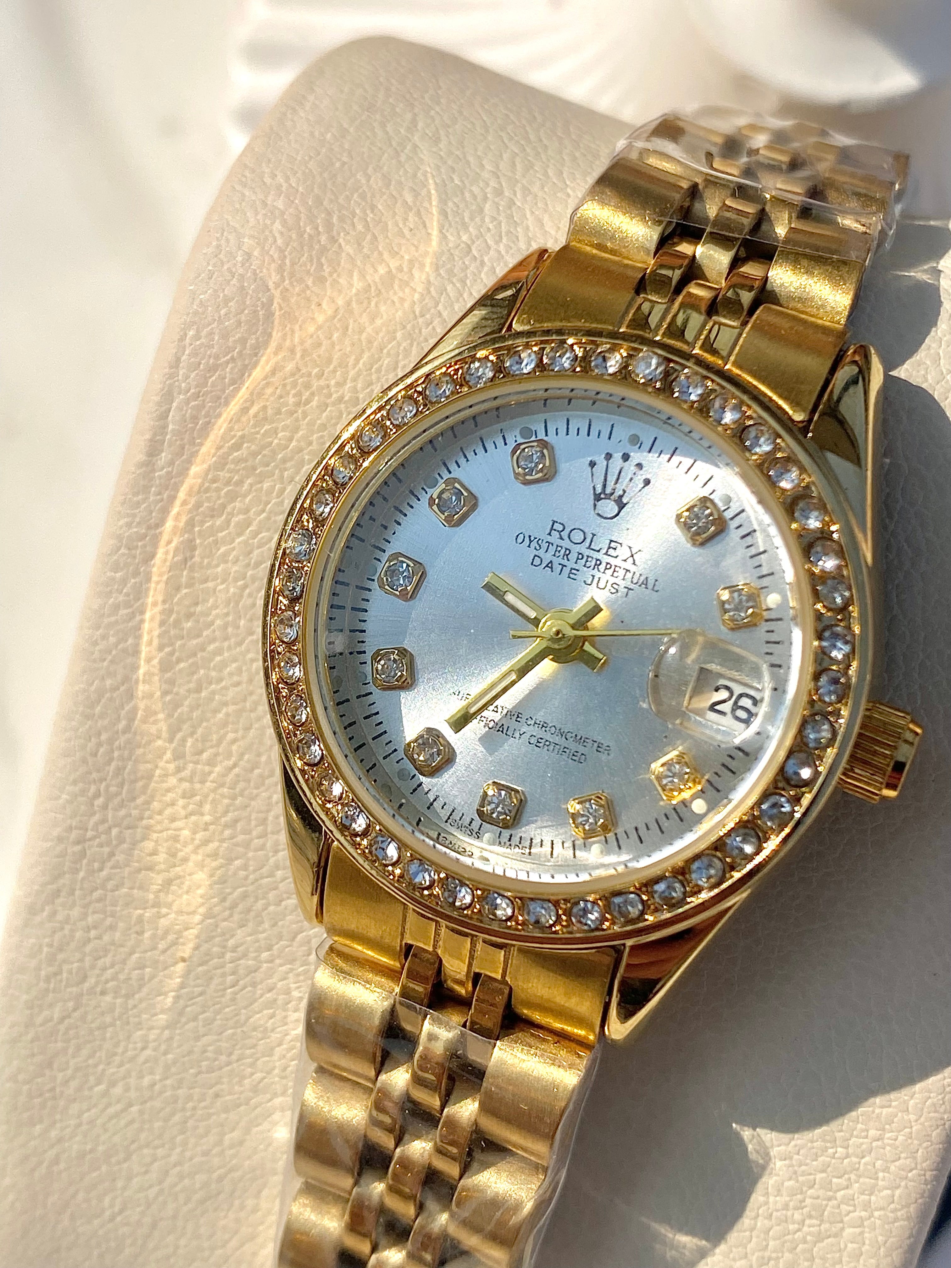 Crystal pearl studded dial watch