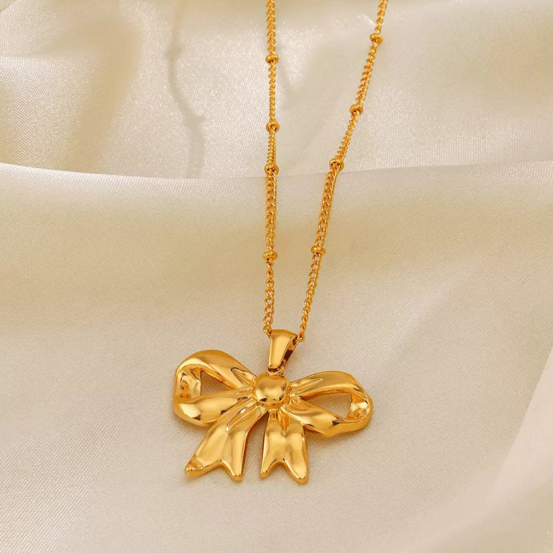 ✨Stainless steel Gold Bow beaded Pendant ✨