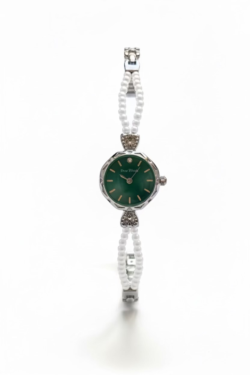 Emerald dial pearl braided silver watch