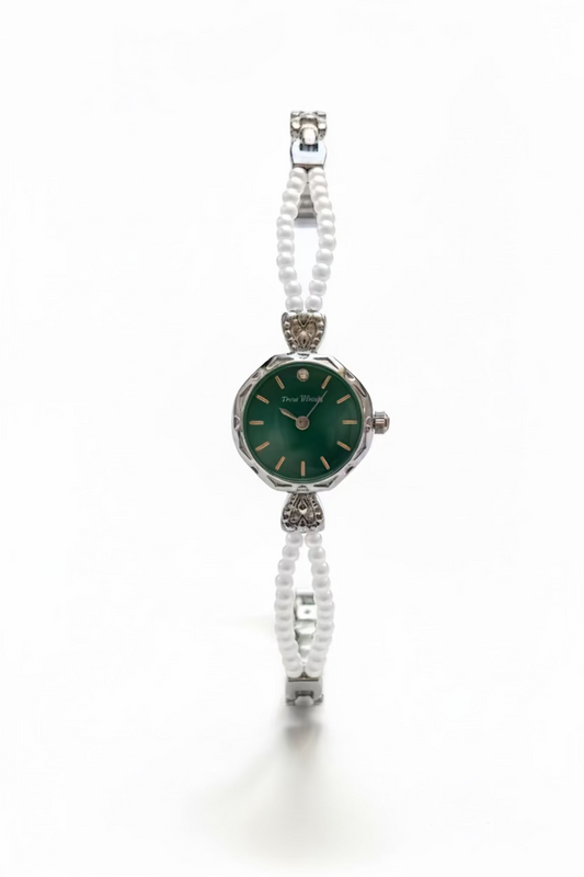 Emerald dial pearl braided silver watch
